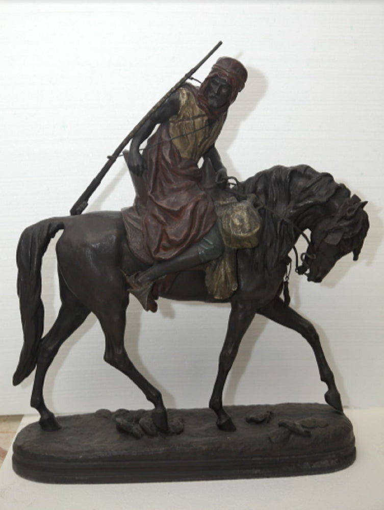 A FRENCH COLD-PAINTED SPELTER MODEL OF AN ARAB HUNTER ON HORSEBACK
